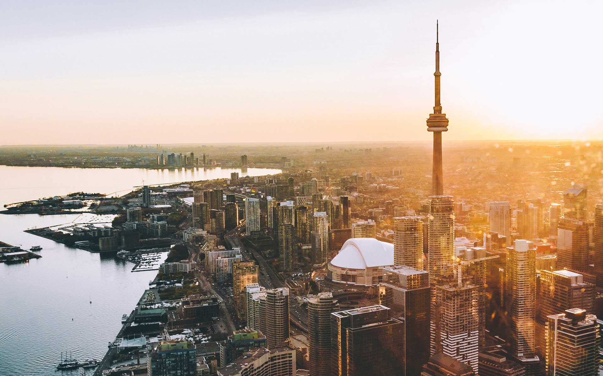 Photo of Toronto skyline with CN Tower in the at the front and Etobicoke in the background